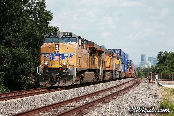 UP 7641 leads a ZATLC train across the I-10 overpass just west of downtown Houston, TX on August 11, 2012