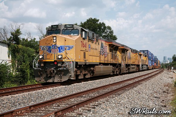 UP 7641 leads a ZATLC train across the I-10 overpass just west of downtown Houston, TX on August 11, 2012