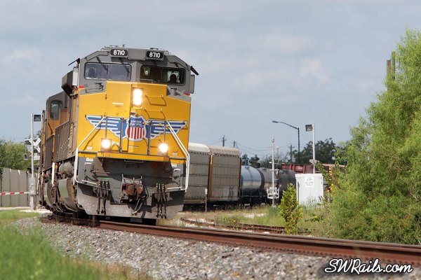 Union Pacific SD70ACe 8710 on QWCEW freight train at Missouri City TX