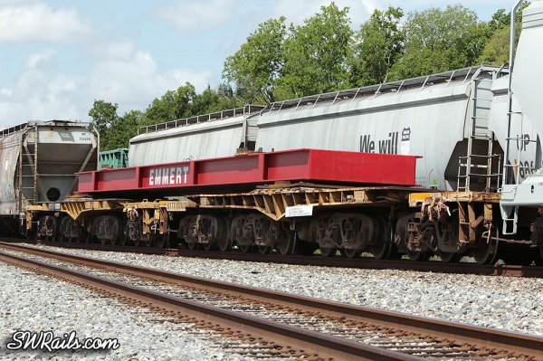 Emmert load on 2 12-axle QTTX flat cars
