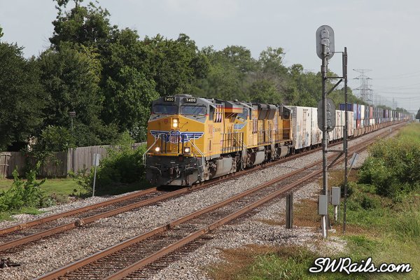 UP 7400, the Komen "pink ribbon" unit leads ZLCAT train at Houston, TX