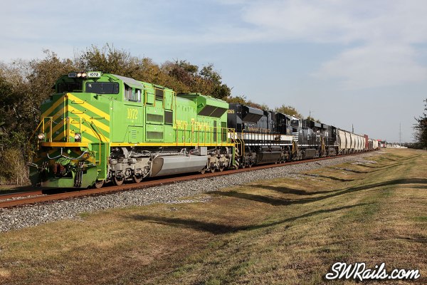 NS 1072 (Illinois terminal Heritage) leads UP freight train MEWEY-21 at Stafford, TX on 11/21/2012