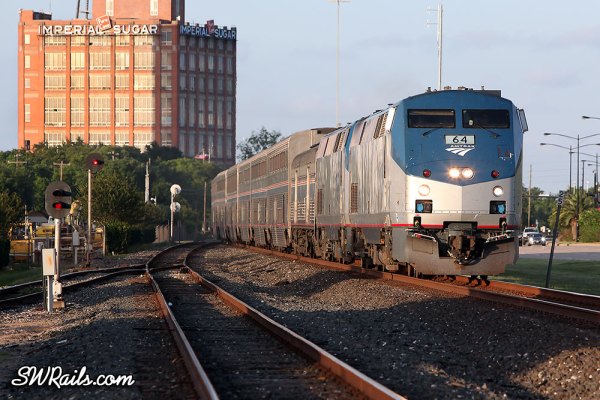 Amtrak P42 64 leads the Sunset Limited through Sugar Land, TX on 6/1/2013.