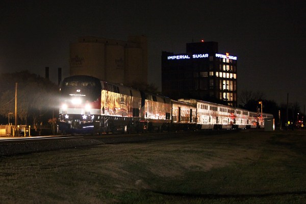 AMTK P42DC 42 Veterans Commemorative unit leading westbound Sunset limited at Sugar Land TX 12/30/2013
