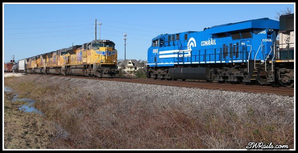 NS 8098, Conrail heritage locomotive,  and UP SD70ACE 8454 at Harlem, TX on 11-24-2014