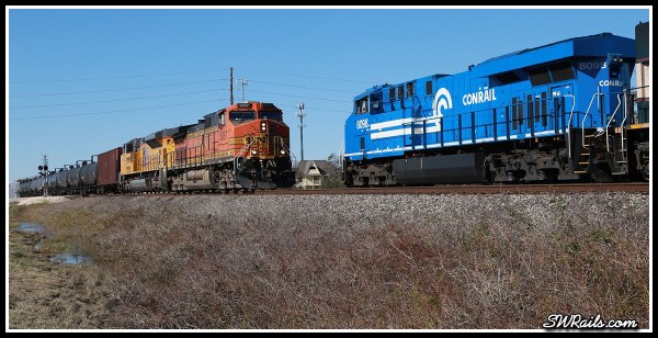 NS 8098, Conrail heritage locomotive,  and BNSF C44-9W 5057 at Harlem, TX on 11-24-2014